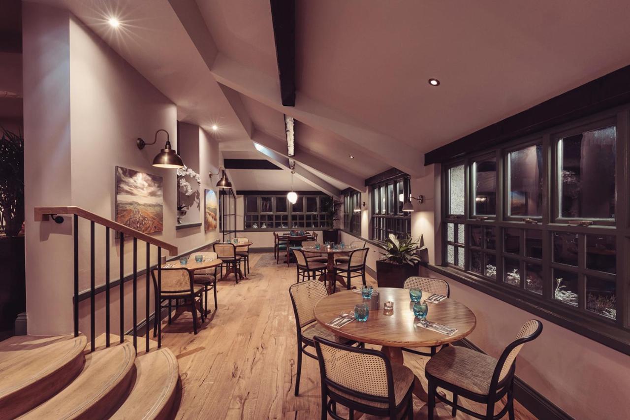 Longlands Inn & Cottages Carnforth Exterior foto The interior of the restaurant